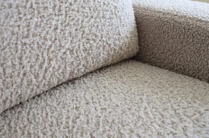 Narożnik z funkcją spania do salonu NIRVANA PLUS boucle owieczka kremowy